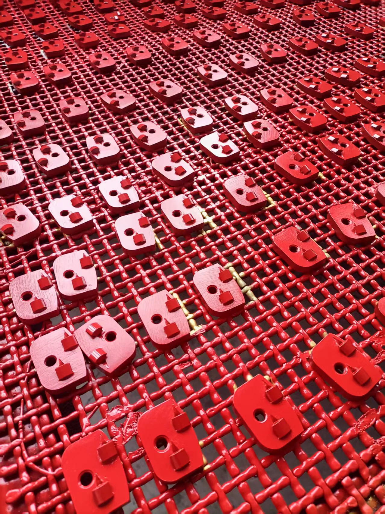 Round button segments on metal mounting grid plate